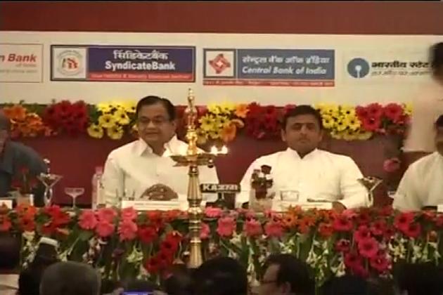 Chidambaram and Akhilesh Yadav share a stage at a function in Lucknow. Photo: ibnlive