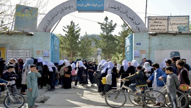 Afghan school girls return home in tears after Taliban reverses decision on education