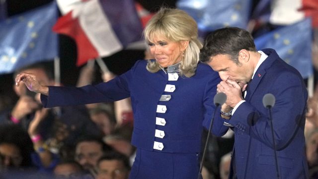 Sealed with a kiss! Emmanuel Macron celebrates after historic French election win