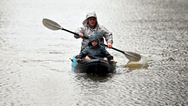 Drenched to the bone: Torrential rain leaves Sydney residents in flood misery