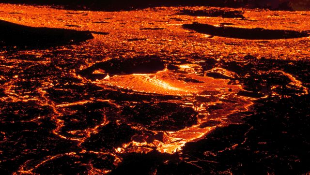 Turning red: Rivers of lava flow as Iceland's Fagradalsfjall volcano erupts